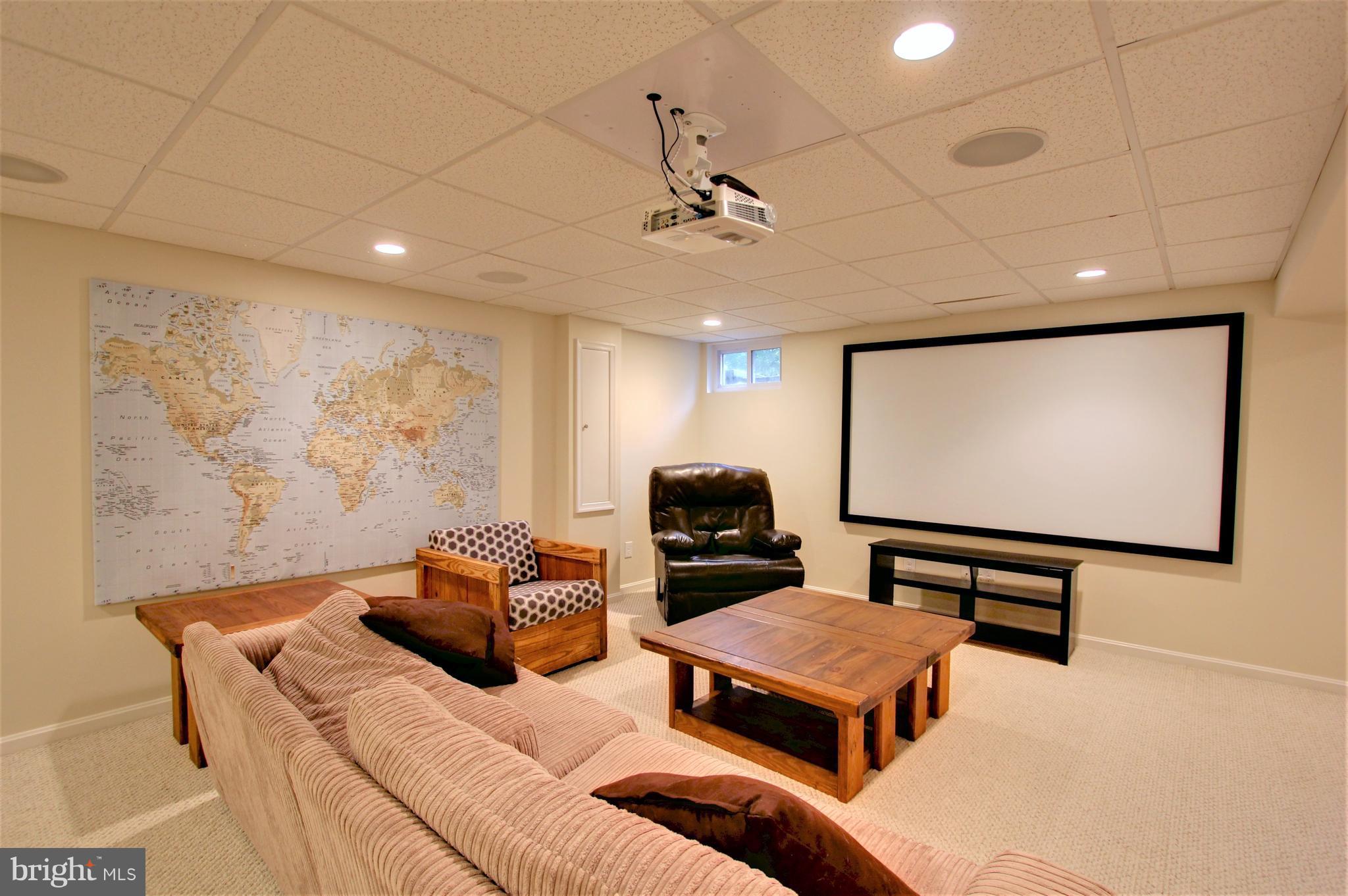 10228 Scaggsville Road Laurel, MD 20723 - Photo 28 of 30 Theatre screen and overhead projector convey.