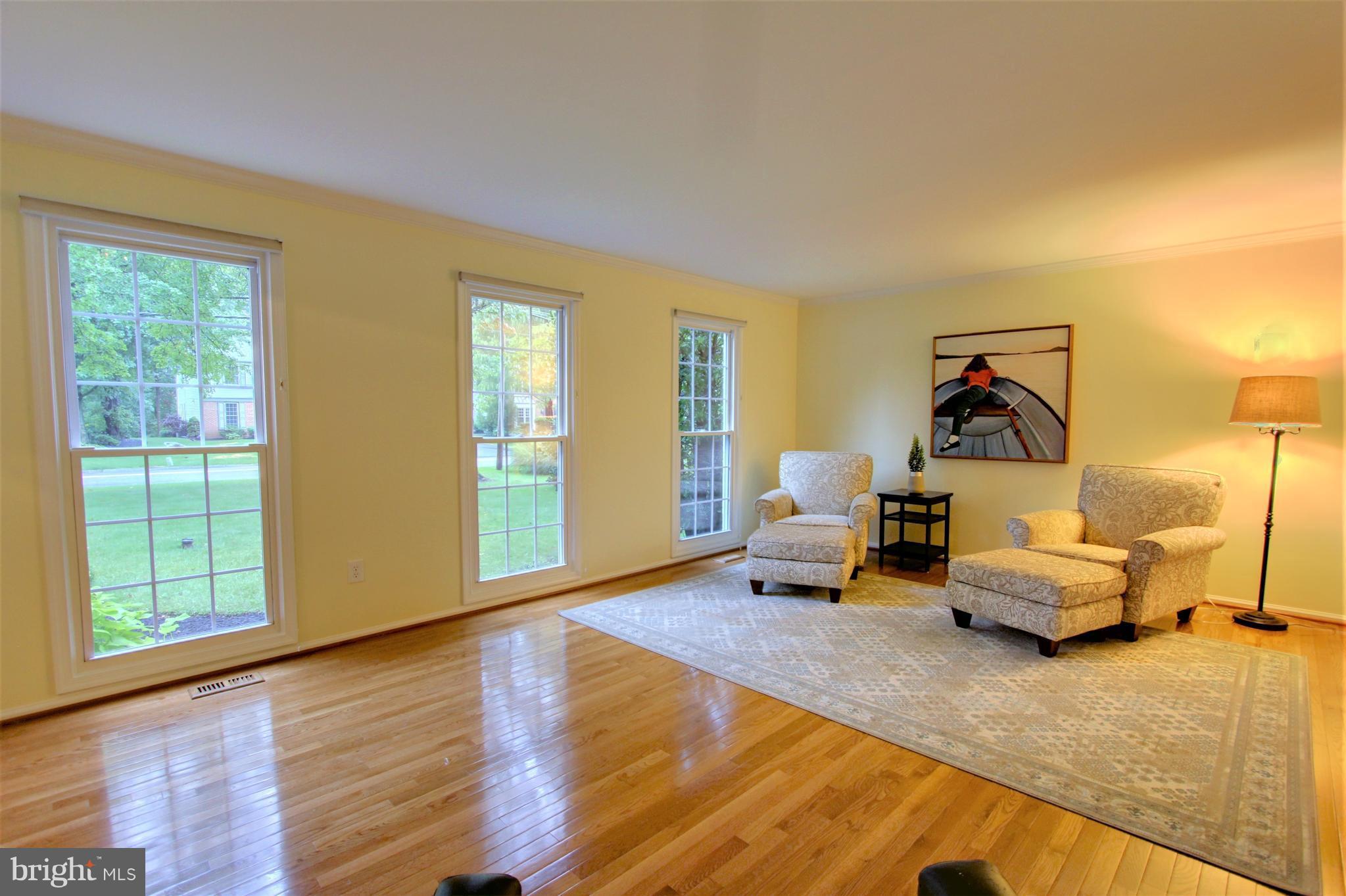 10228 Scaggsville Road Laurel, MD 20723 - Photo 7 of 30 Beautiful hardwood floor and full-length windows.