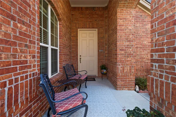 a view of a outdoor seating area with furniture