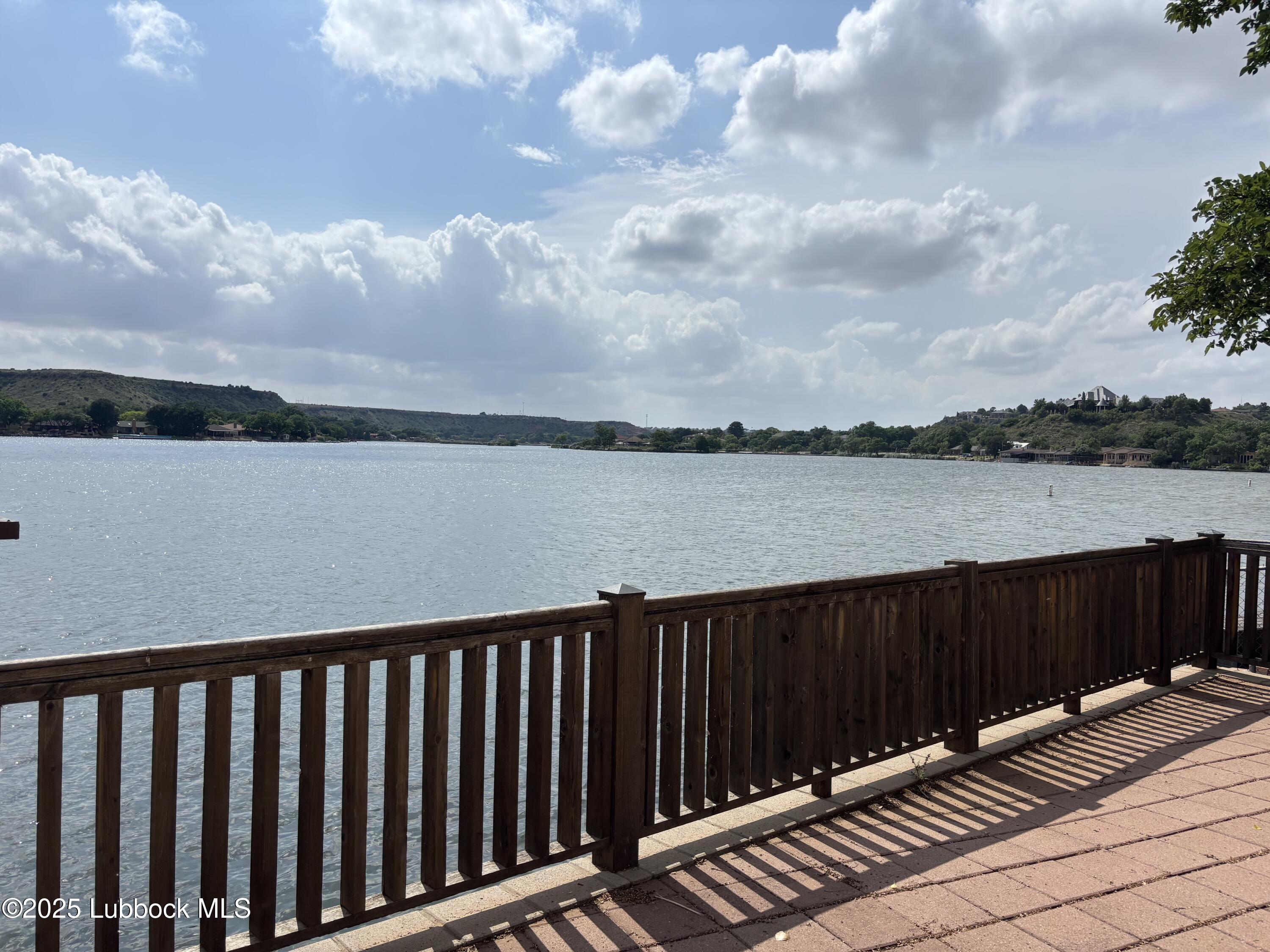 53 East Lakeshore Drive Ransom Canyon, TX 79366 - Photo 1 of 43 a balcony with wooden floor
