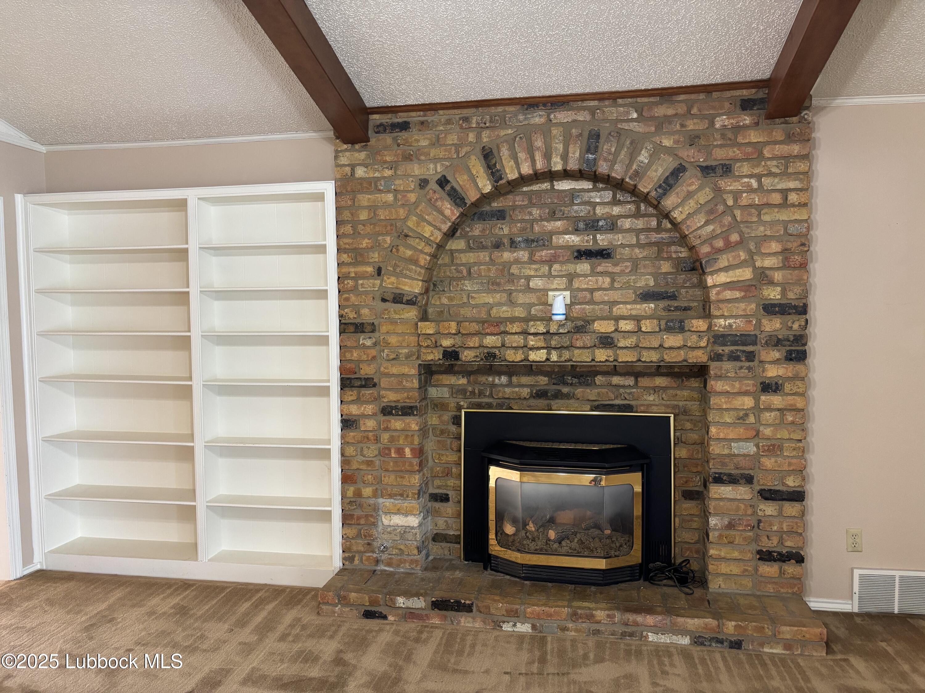 53 East Lakeshore Drive Ransom Canyon, TX 79366 - Photo 12 of 43 a living room with a fireplace