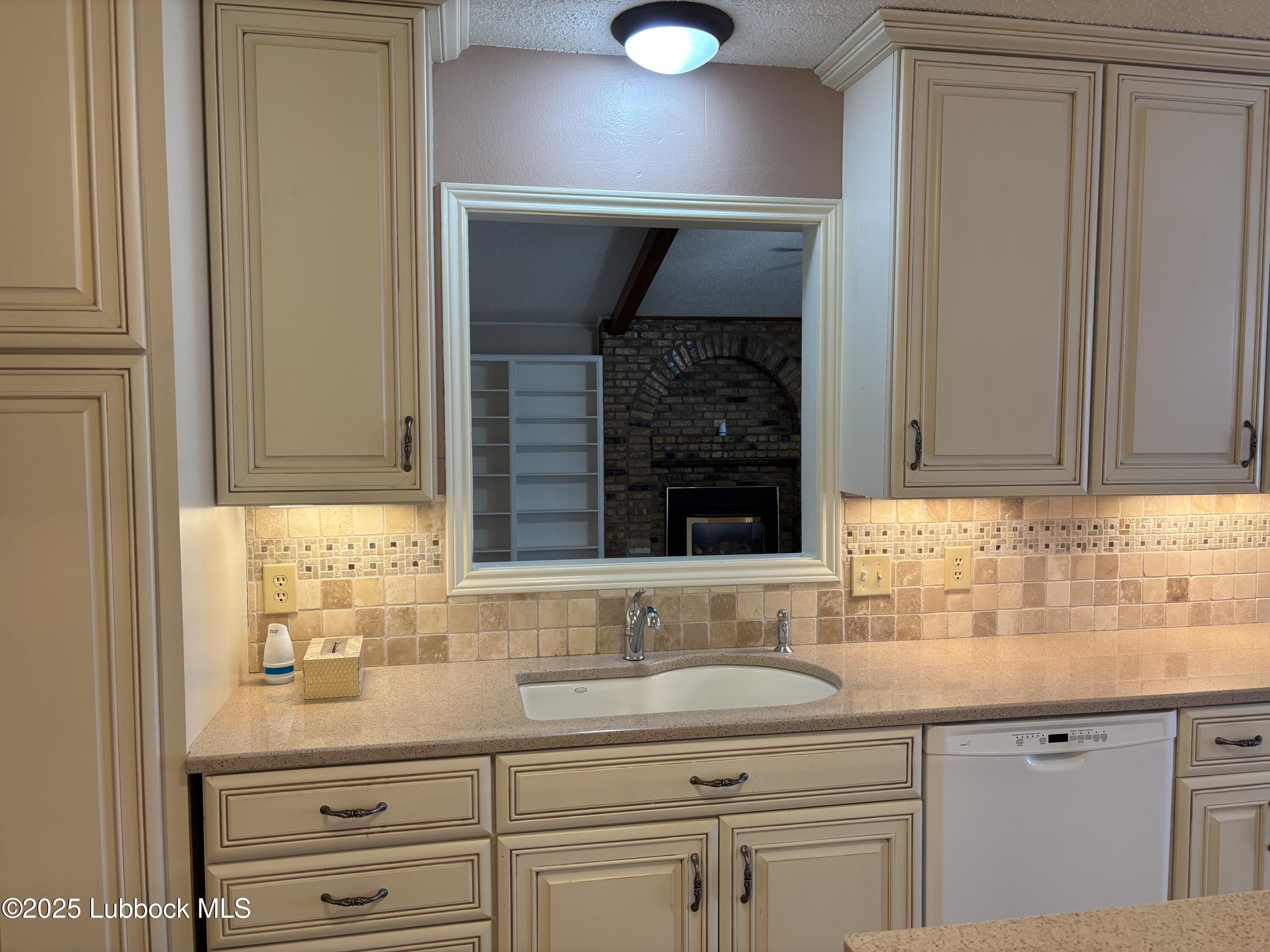 53 East Lakeshore Drive Ransom Canyon, TX 79366 - Photo 22 of 43 a bathroom with a sink and a mirror