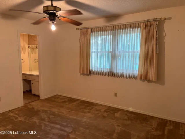 a bathroom with a sink vanity and a mirror