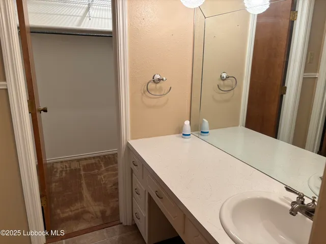 an empty room with fan