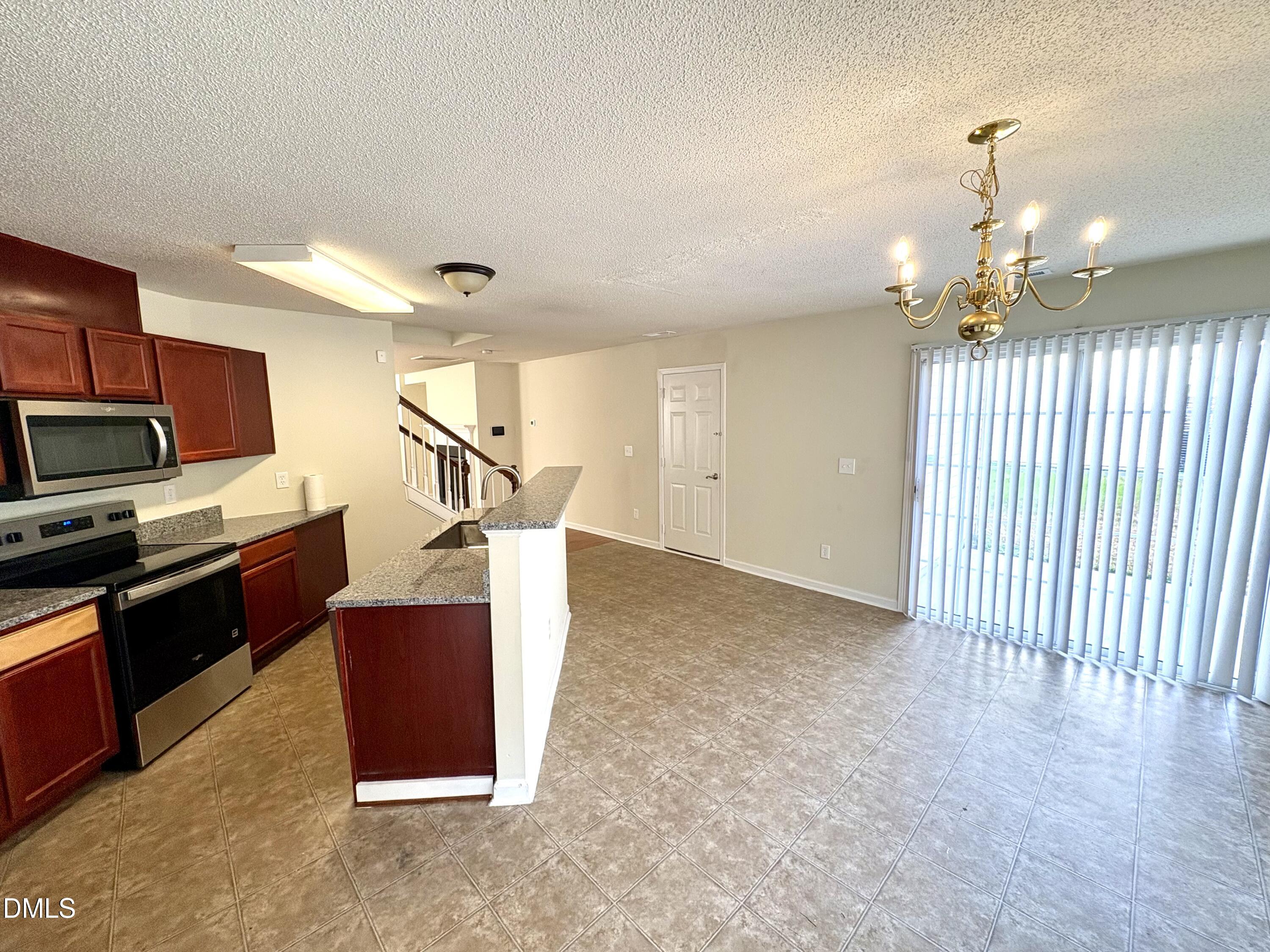 2422 Quarry Ridge Lane Raleigh, NC 27610 - Photo 4 of 10 a view of kitchen and furniture