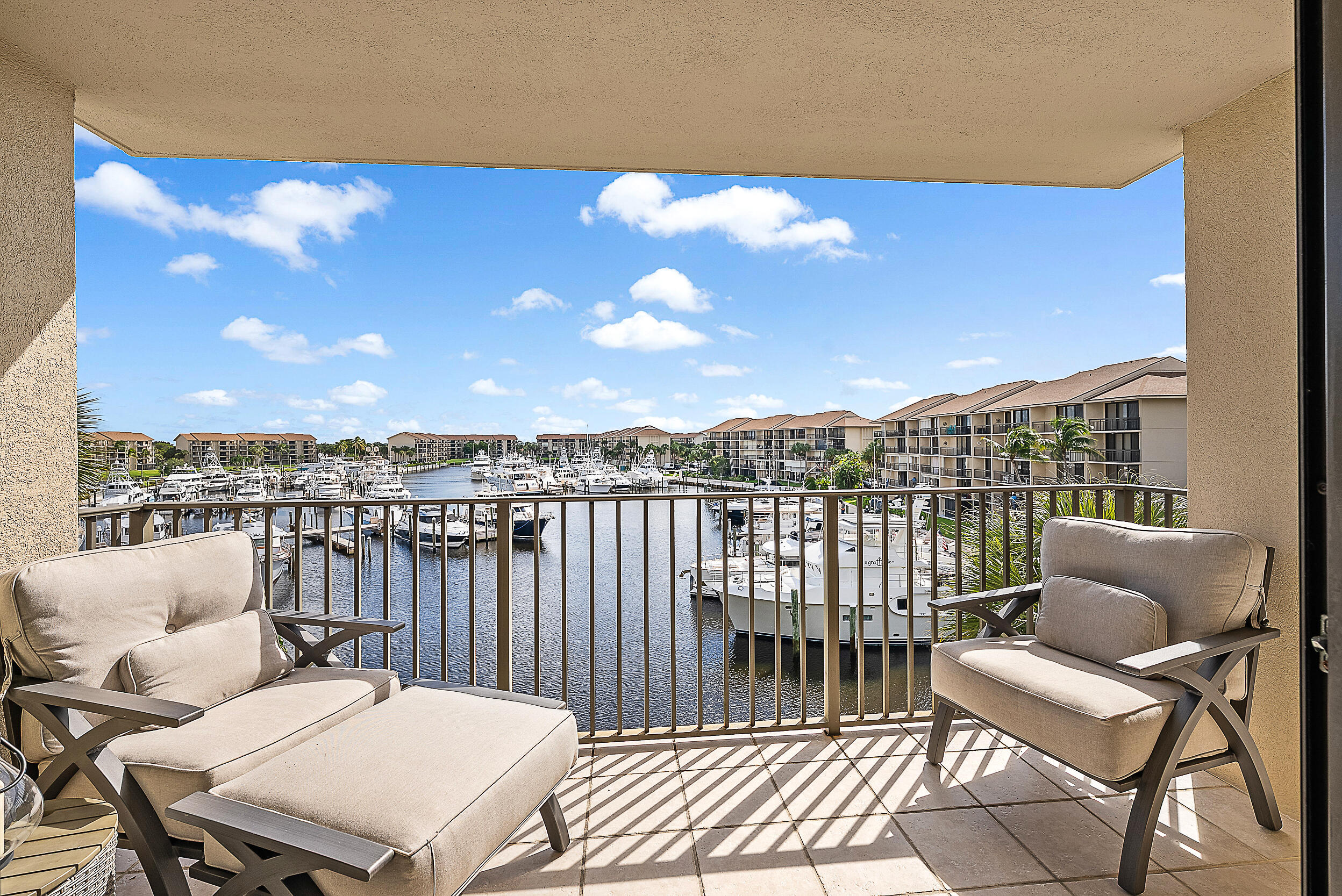 1601 Marina Isle Way, Unit 402 Jupiter, FL 33477 - Photo 1 of 37 Daylight Marina Balcony View