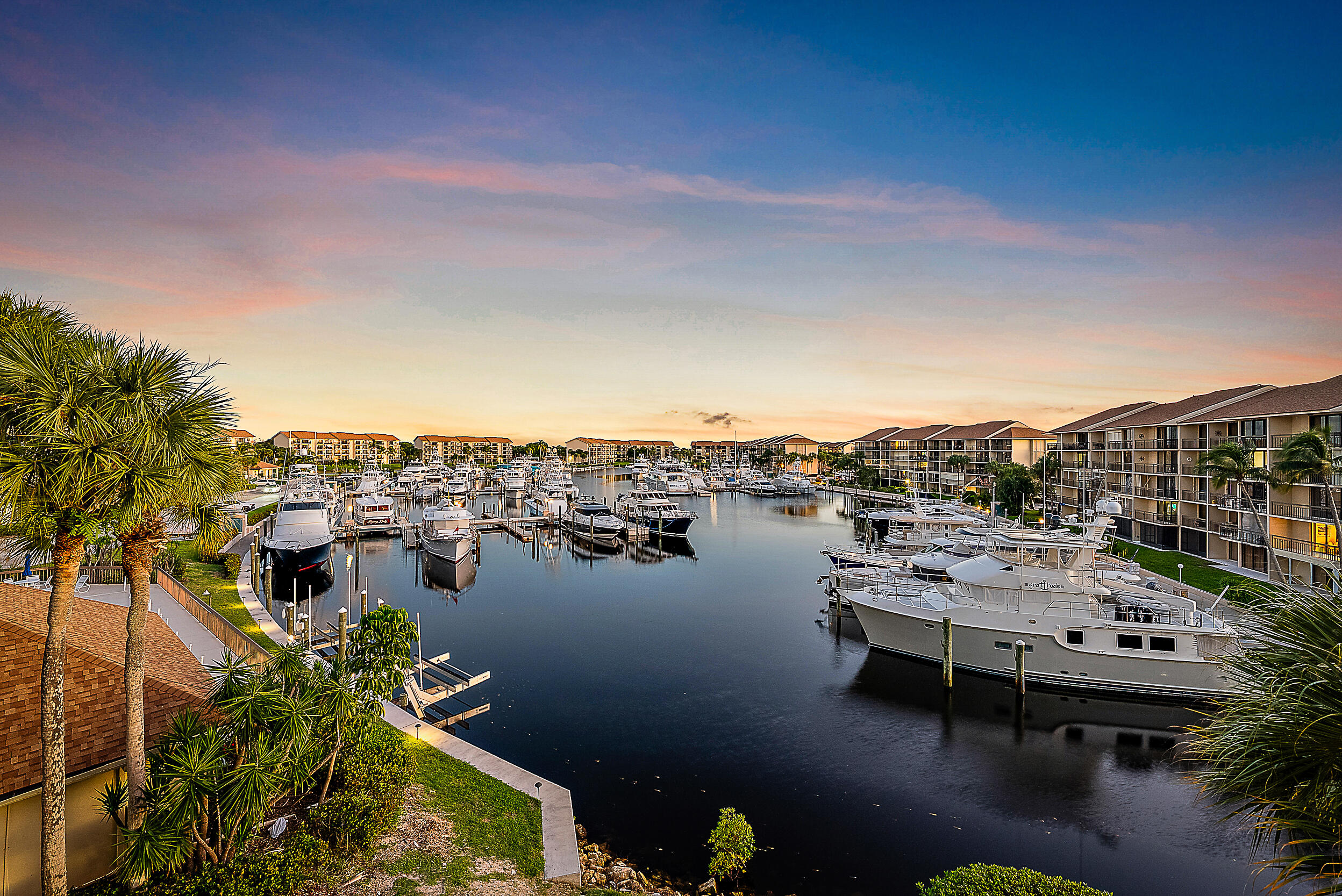 1601 Marina Isle Way, Unit 402 Jupiter, FL 33477 - Photo 2 of 37 Sunset Harbor View from 1st Porch
