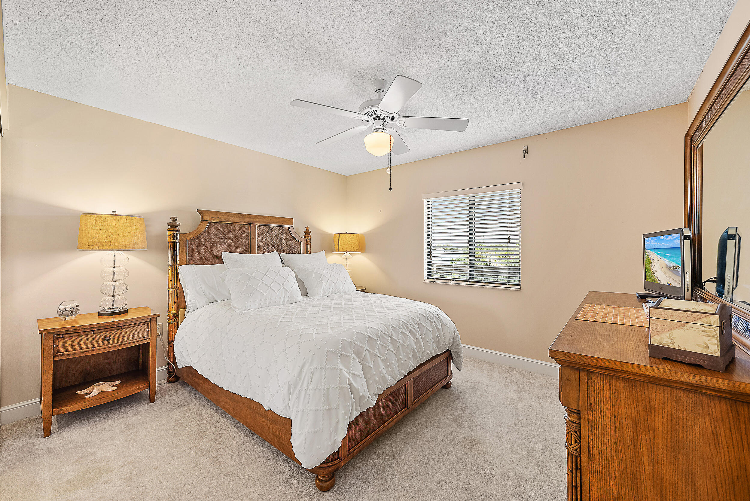 1601 Marina Isle Way, Unit 402 Jupiter, FL 33477 - Photo 10 of 37 Primary Bedroom