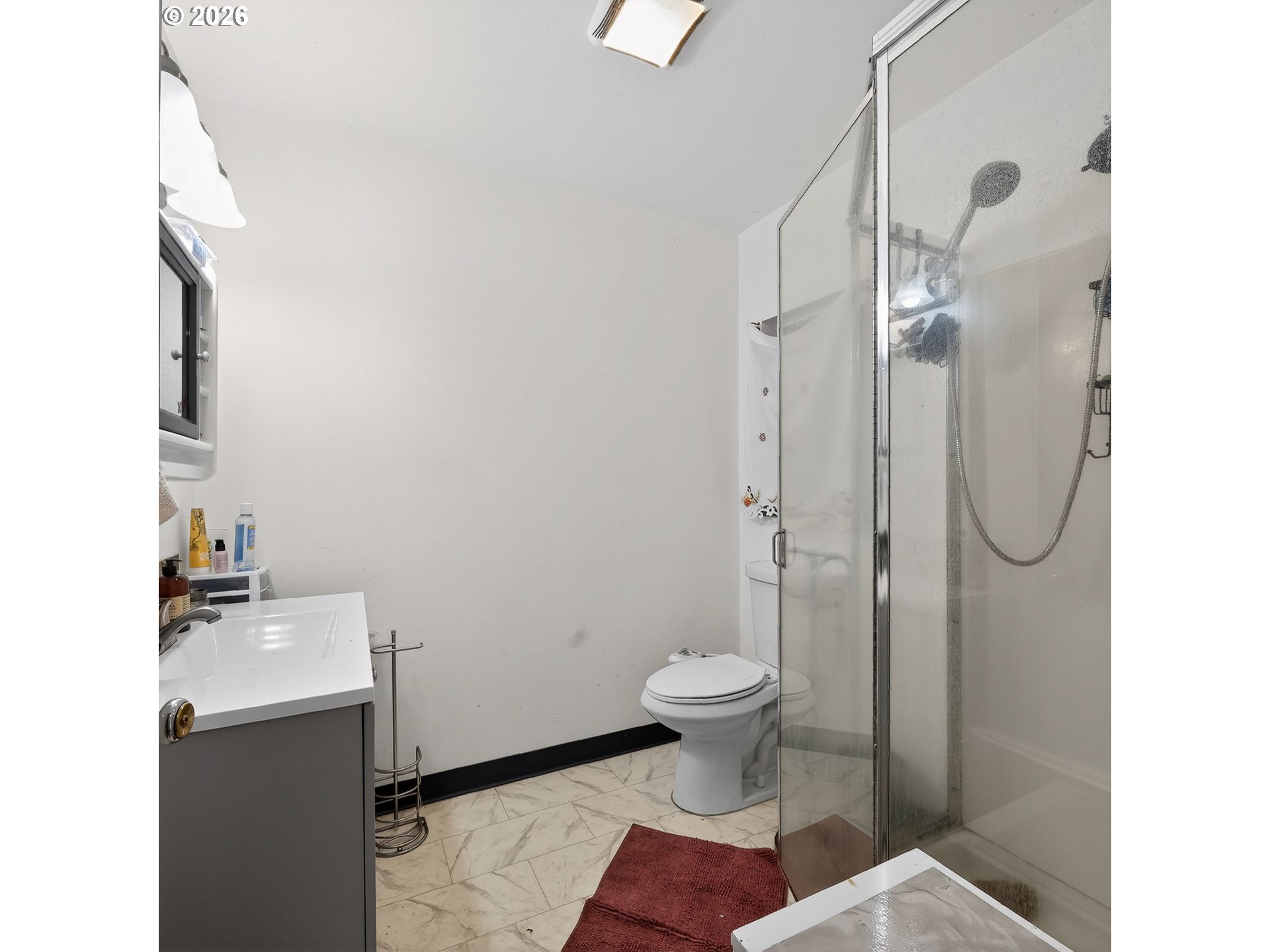 92981 Prairie Road Junction City, OR 97448 - Photo 17 of 29 a bathroom with a sink toilet and shower