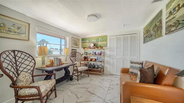 a living room with furniture and a couch