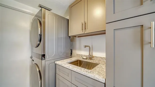 a view of a chair and table in the patio