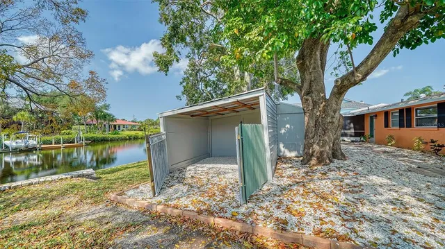 a outdoor living space with furniture and a rug