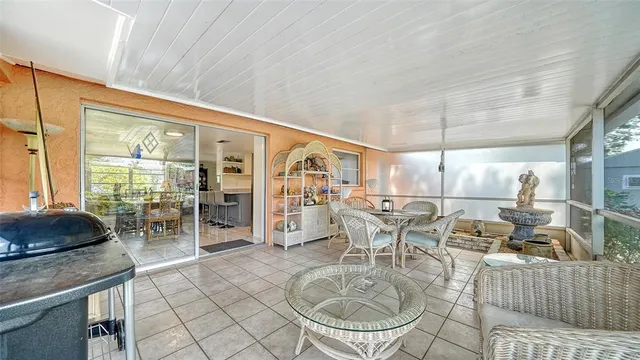 a outdoor dining space with furniture and garden view