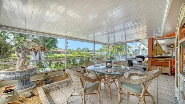 a kitchen with stainless steel appliances granite countertop a sink and a refrigerator