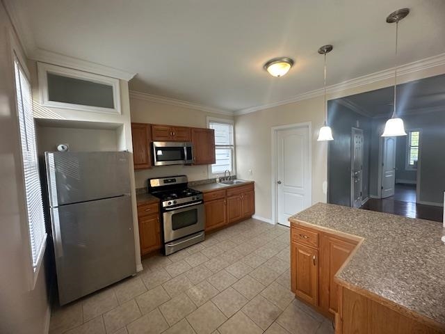 101 Avenue F, Unit 2 Bayonne, NJ 07002 - Photo 1 of 10 a kitchen with stainless steel appliances granite countertop a refrigerator a stove a sink and a microwave