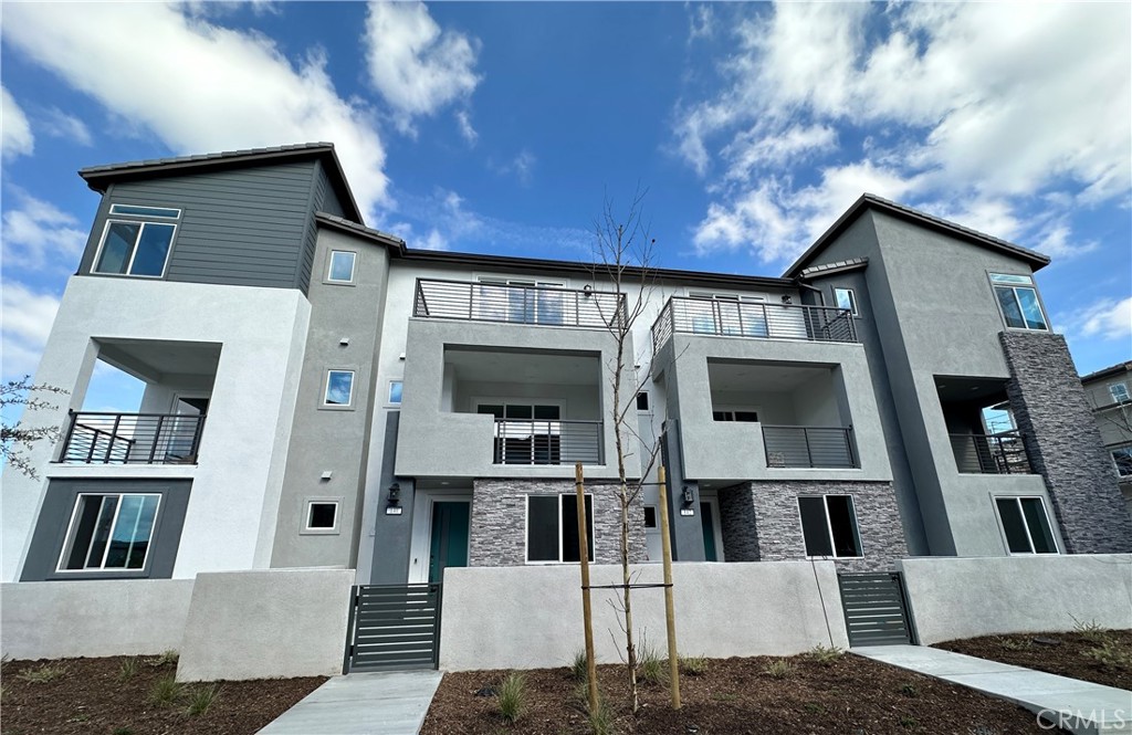 140 Abacus Irvine, CA 92618 - Photo 1 of 1 a view of a house with a yard
