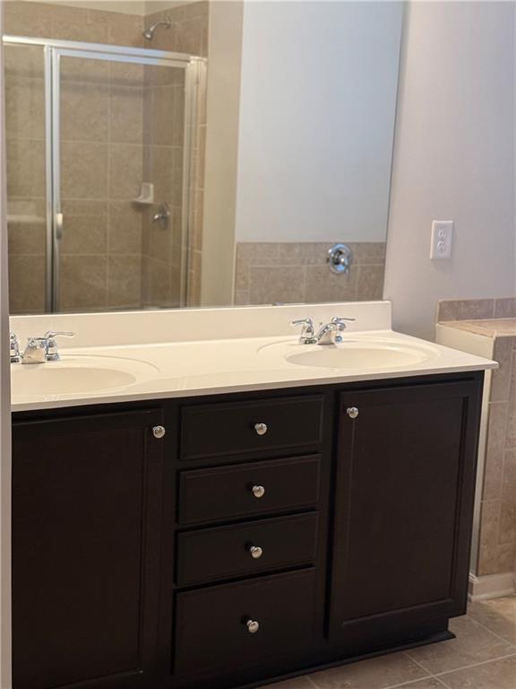 3144 Spicy Cedar Lane Lithonia, GA 30038 - Photo 14 of 18 a bathroom with a sink vanity and a mirror