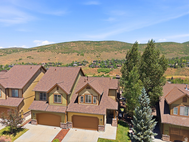 3148 Lower Saddleback Road Park City, UT 84098 - Photo 5 of 67 Duplex property featuring multi-toned siding, stone accents, and an attached two-car garage