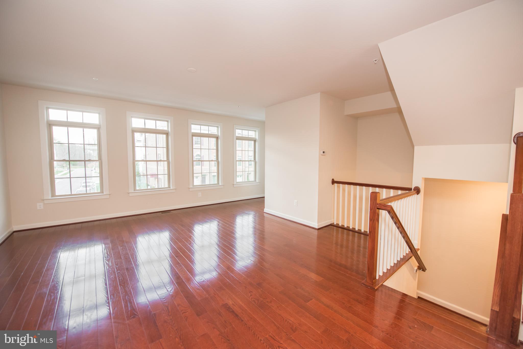 7444 Burnside Way Hanover, MD 21076 - Photo 18 of 46 a view of an entryway with wooden floor