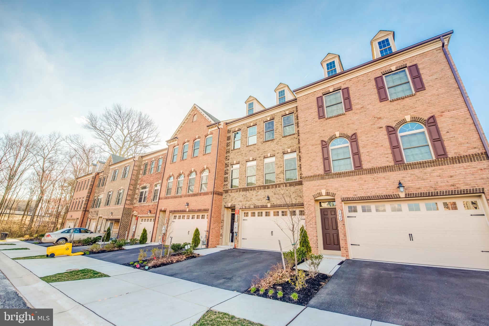 7444 Burnside Way Hanover, MD 21076 - Photo 2 of 46 a front view of a building with street view