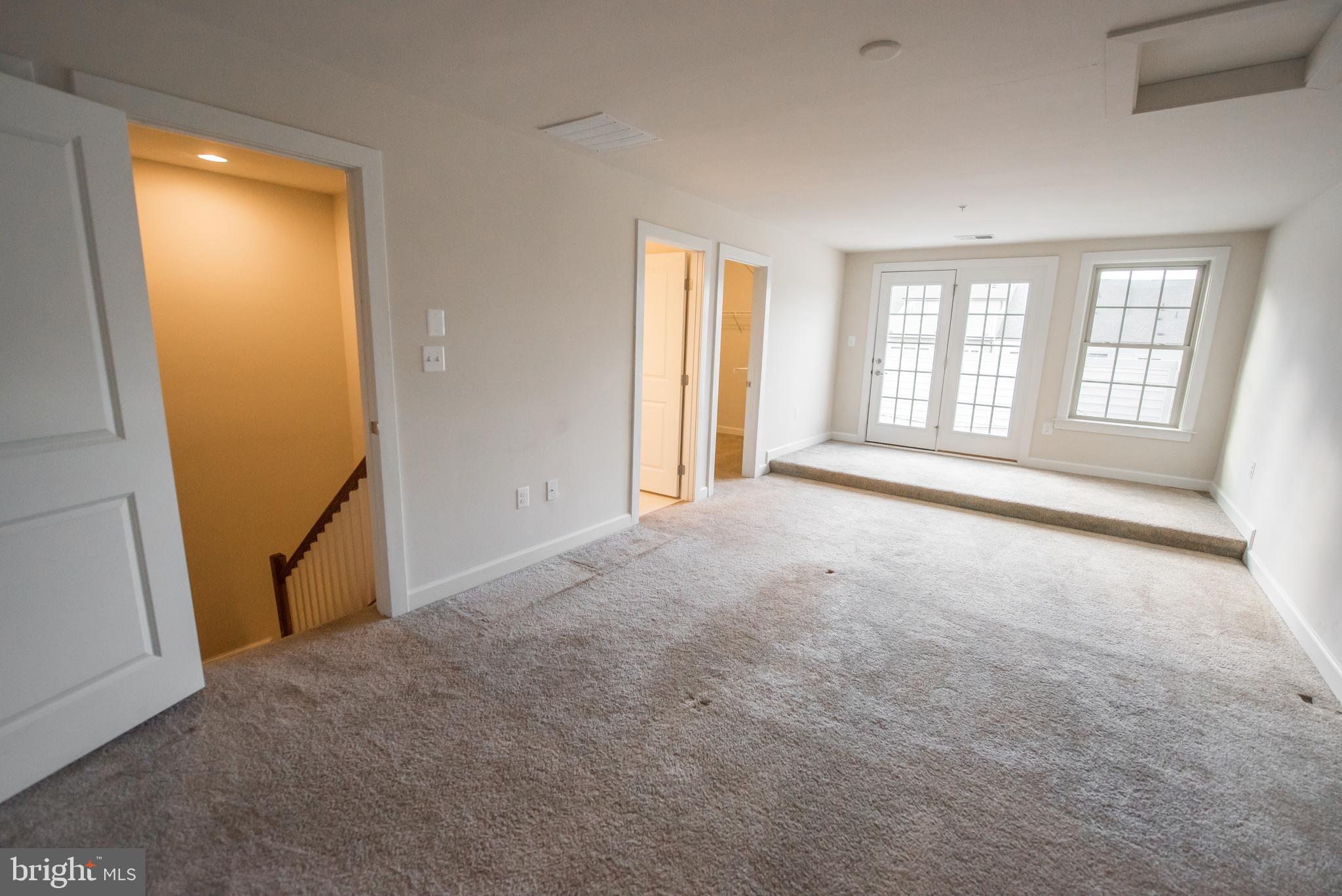7444 Burnside Way Hanover, MD 21076 - Photo 37 of 46 an empty room with windows