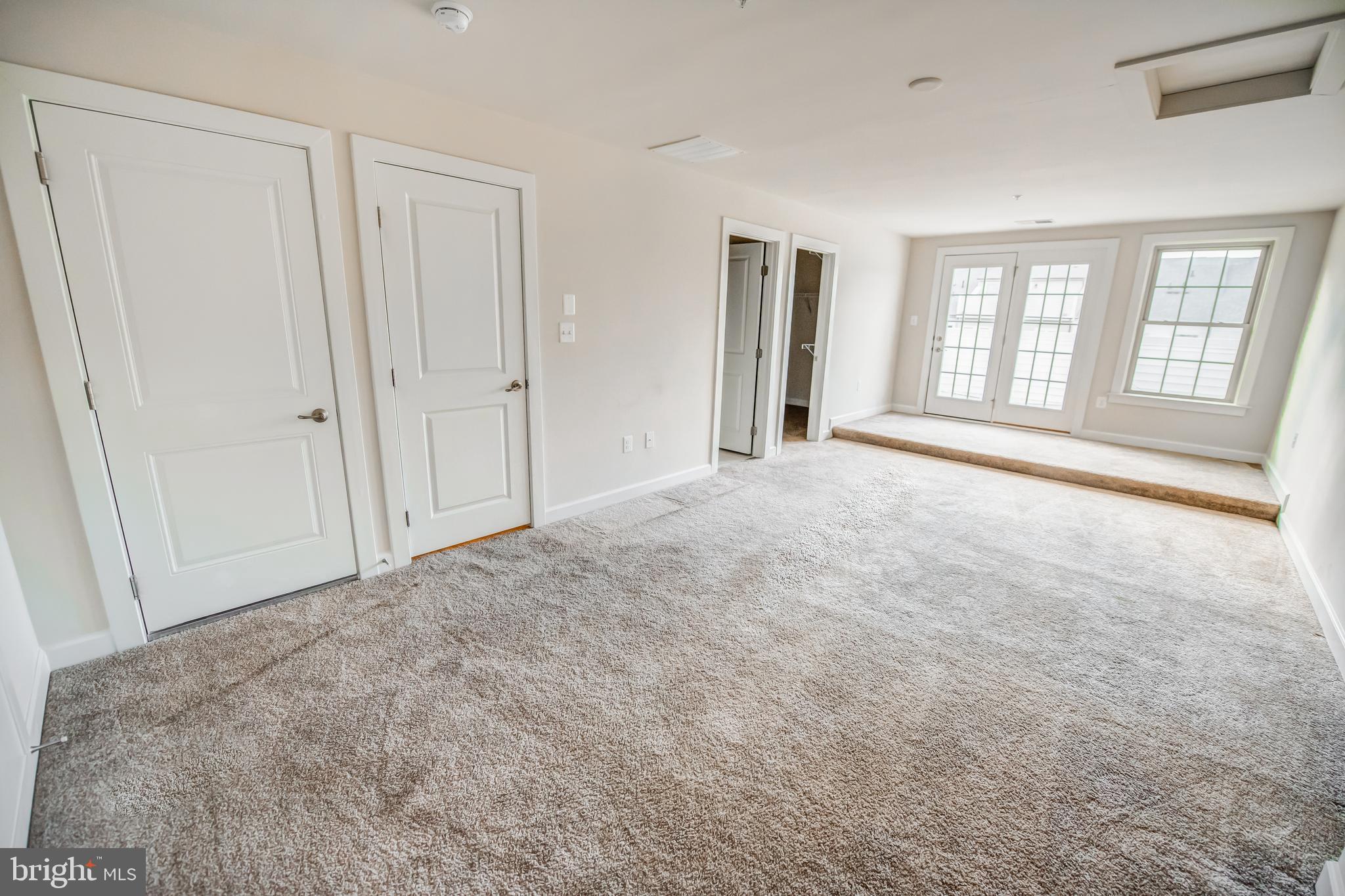 7444 Burnside Way Hanover, MD 21076 - Photo 38 of 46 a view of an empty room with a window