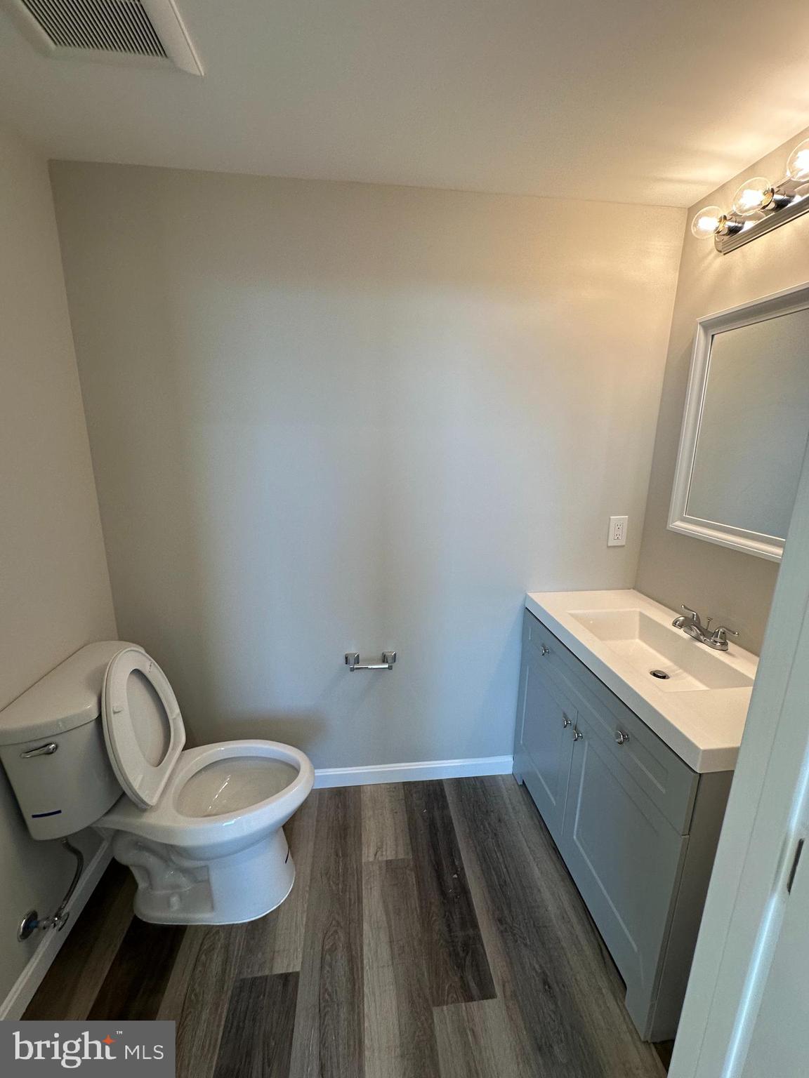 1812 H Place Northeast, Unit 409 Washington, DC 20002 - Photo 5 of 16 a bathroom with a sink and a toilet