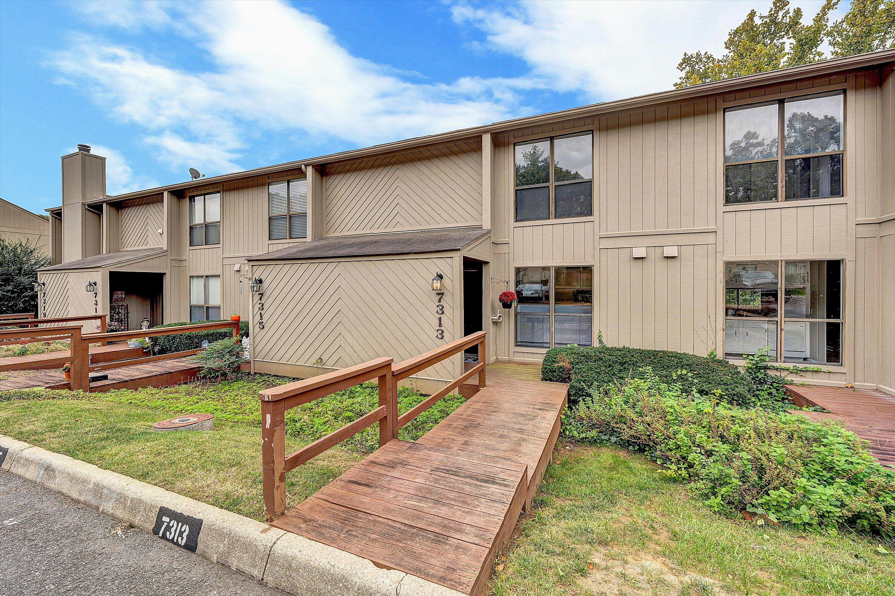 7313 Maple Court Southwest Roanoke, VA 24018 - Photo 1 of 38 a view of a house with backyard and sitting area