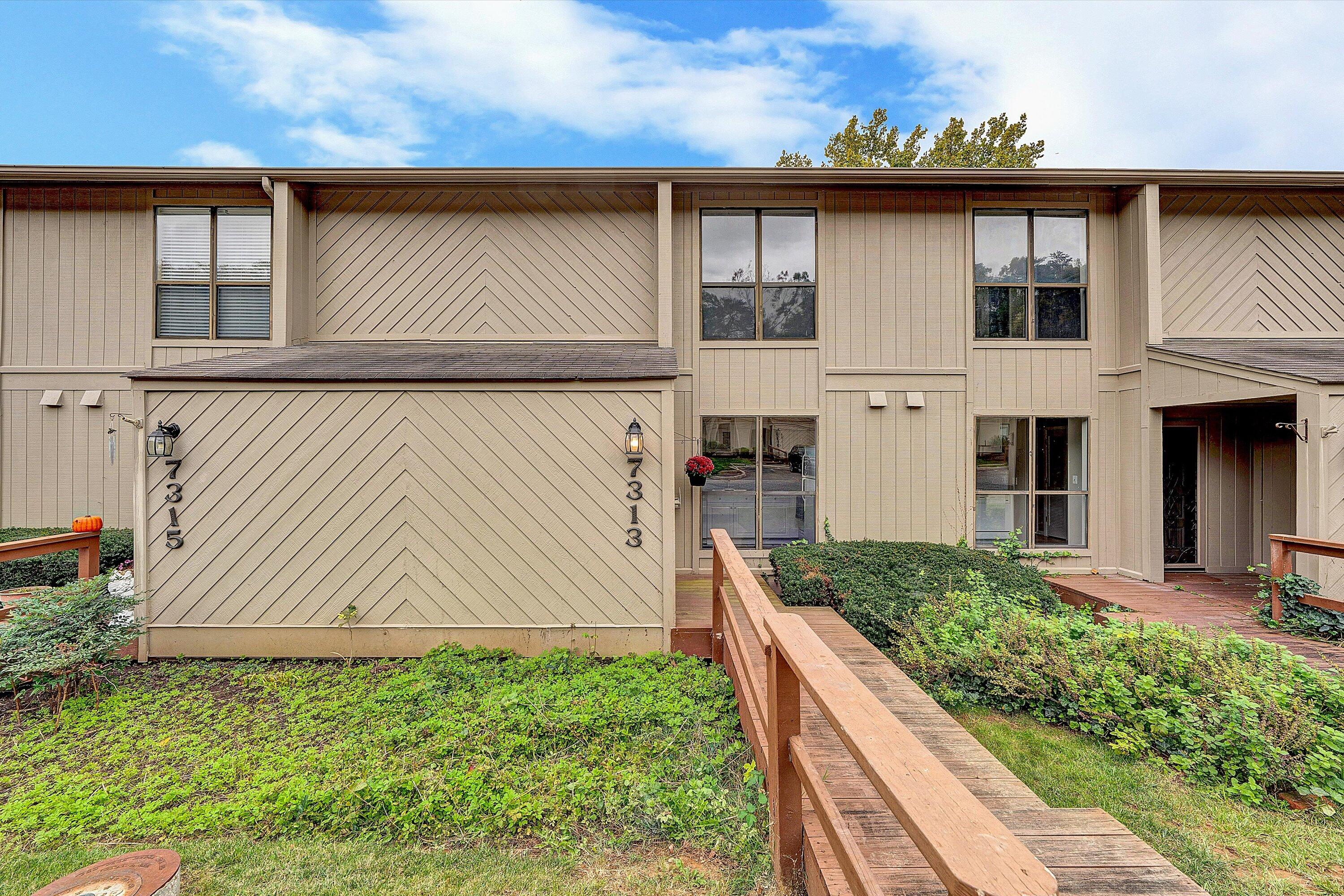 7313 Maple Court Southwest Roanoke, VA 24018 - Photo 2 of 38 a front view of a house with a yard