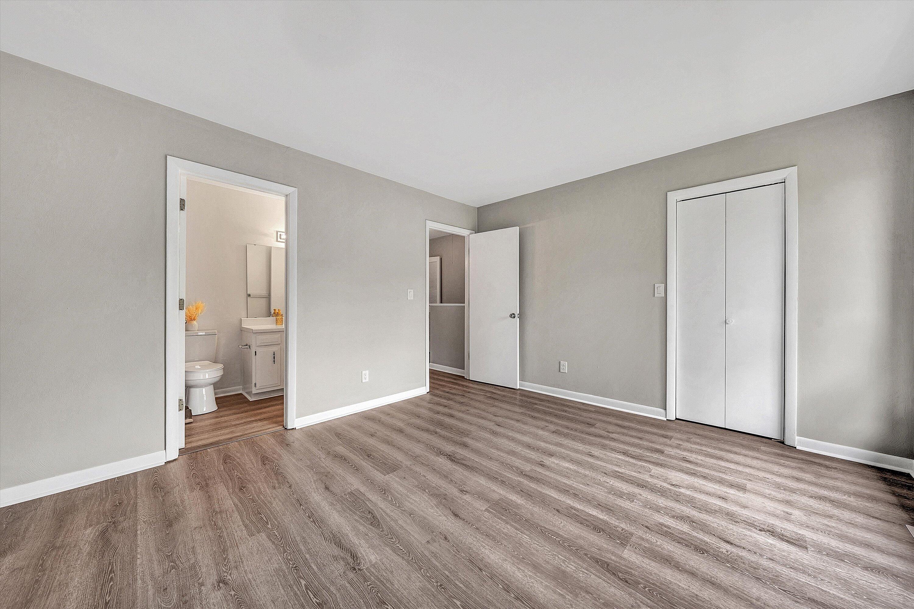 7313 Maple Court Southwest Roanoke, VA 24018 - Photo 23 of 38 a view of an empty room and wooden floor