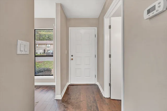 an empty room with windows