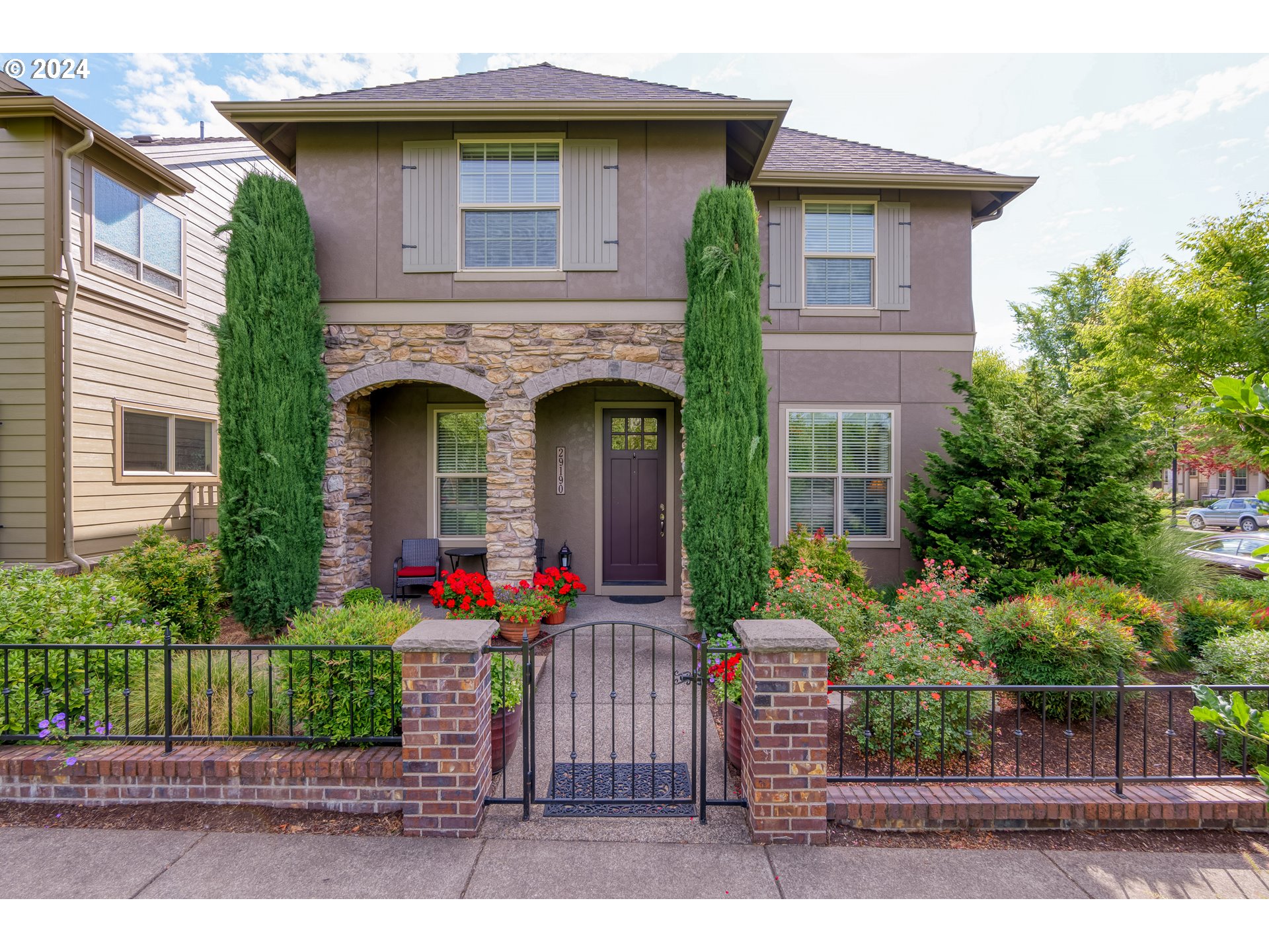 29190 Southwest Serenity Way Wilsonville, OR 97070 - Photo 1 of 40 a front view of a house with plants