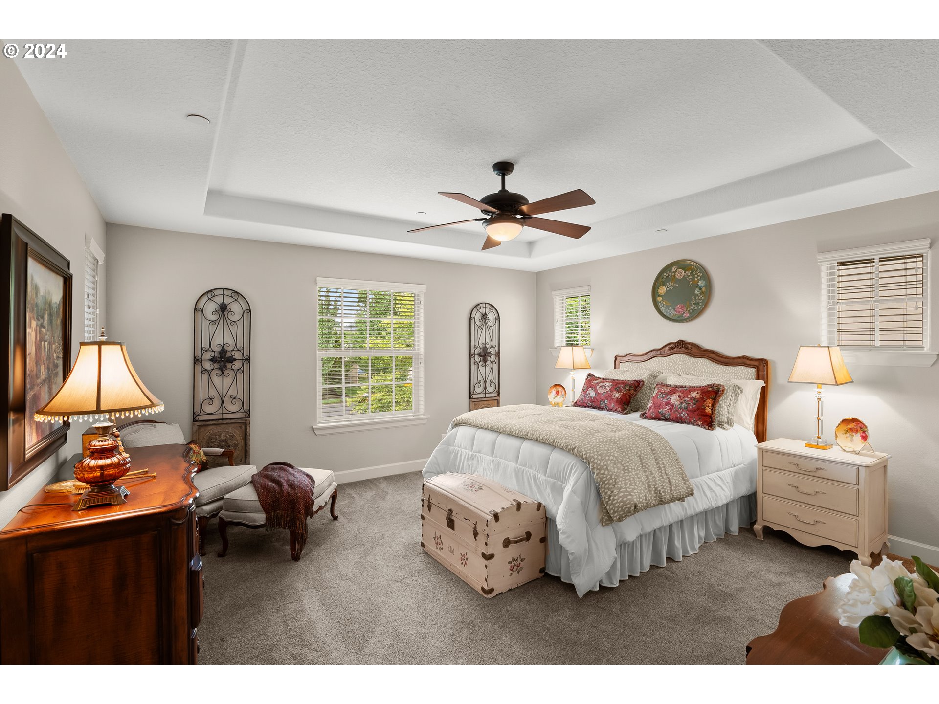 29190 Southwest Serenity Way Wilsonville, OR 97070 - Photo 17 of 40 a bedroom with a bed mirror and window