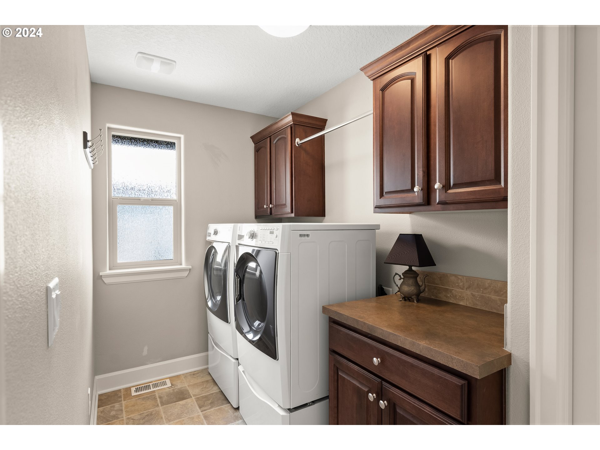 29190 Southwest Serenity Way Wilsonville, OR 97070 - Photo 21 of 40 a utility room with dryer and washer