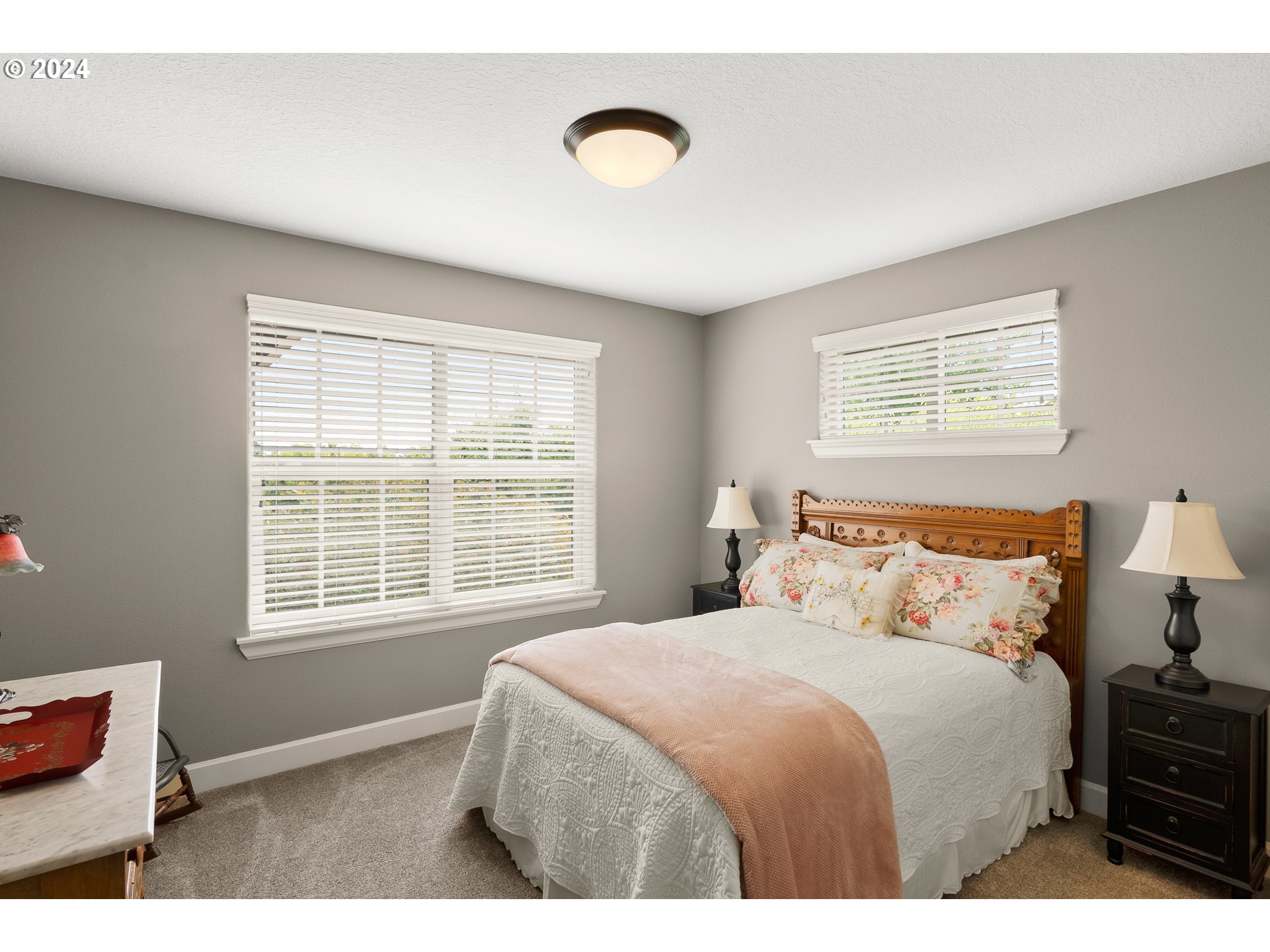 29190 Southwest Serenity Way Wilsonville, OR 97070 - Photo 22 of 40 a bedroom with a bed and a window