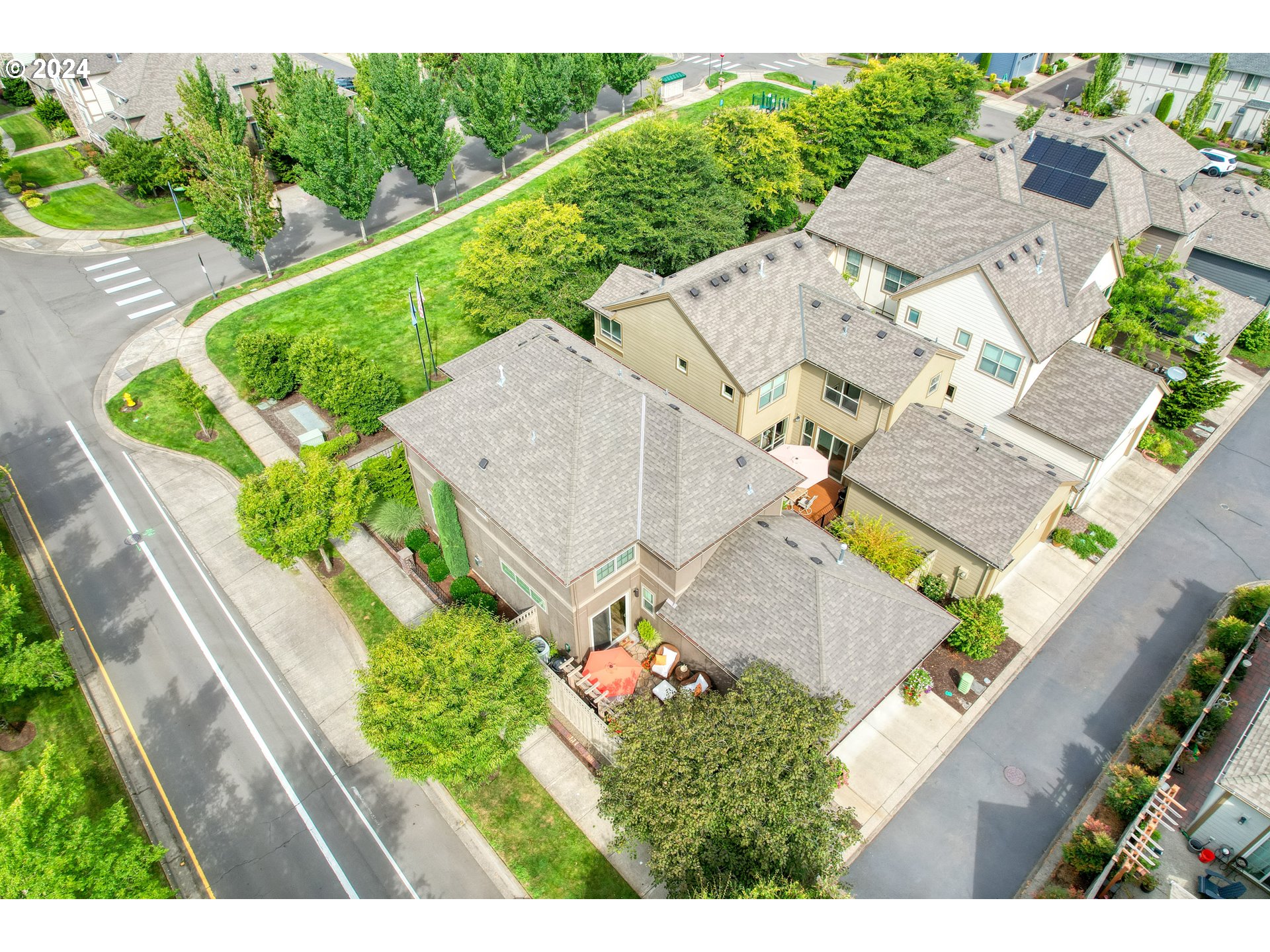 29190 Southwest Serenity Way Wilsonville, OR 97070 - Photo 38 of 40 an aerial view of a house with a garden and a car