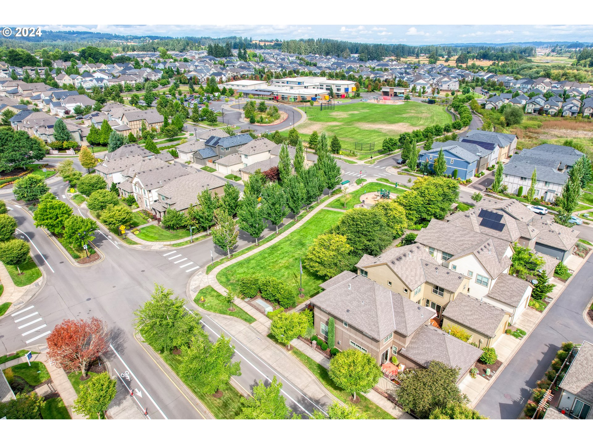 29190 Southwest Serenity Way Wilsonville, OR 97070 - Photo 39 of 40 an aerial view of residential houses with outdoor space and trees