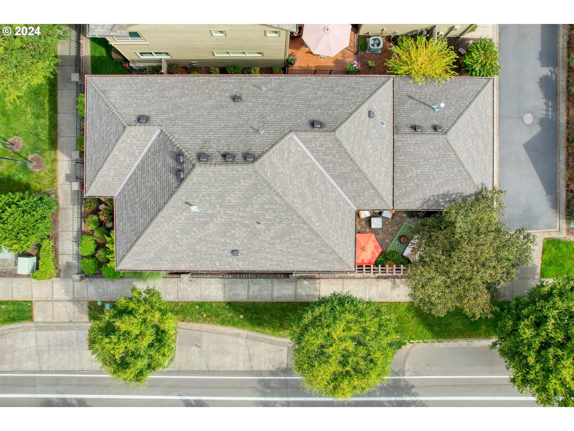 29190 Southwest Serenity Way Wilsonville, OR 97070 - Photo 40 of 40 an aerial view of a house with a yard and potted plants