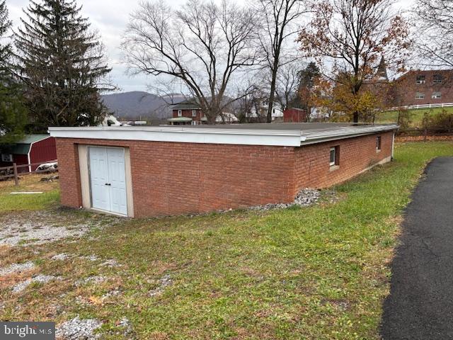 14804 Bell Street Southwest Cresaptown, MD 21502 - Photo 4 of 12 a view of a backyard with large trees