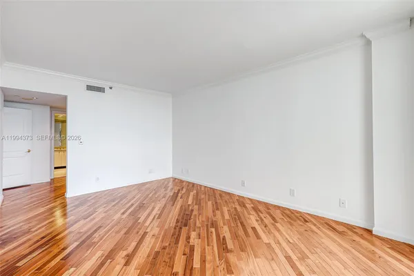 a bathroom with a tub a sink shower and mirror