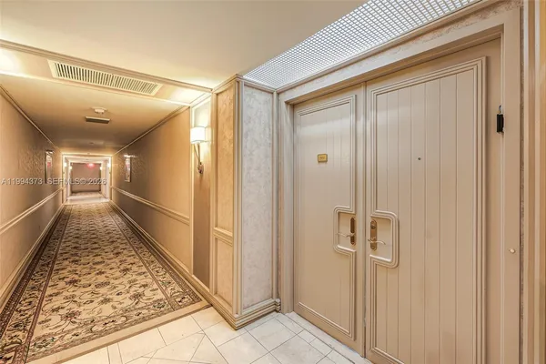 a view of a hallway with a furniture
