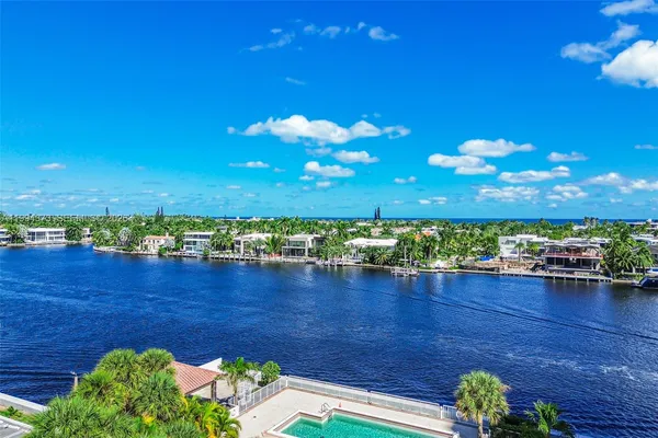 a front view of house with a garden