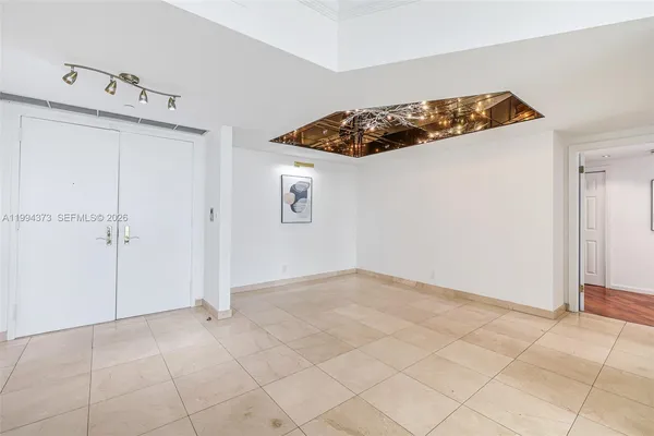 a view of a hallway with entryway