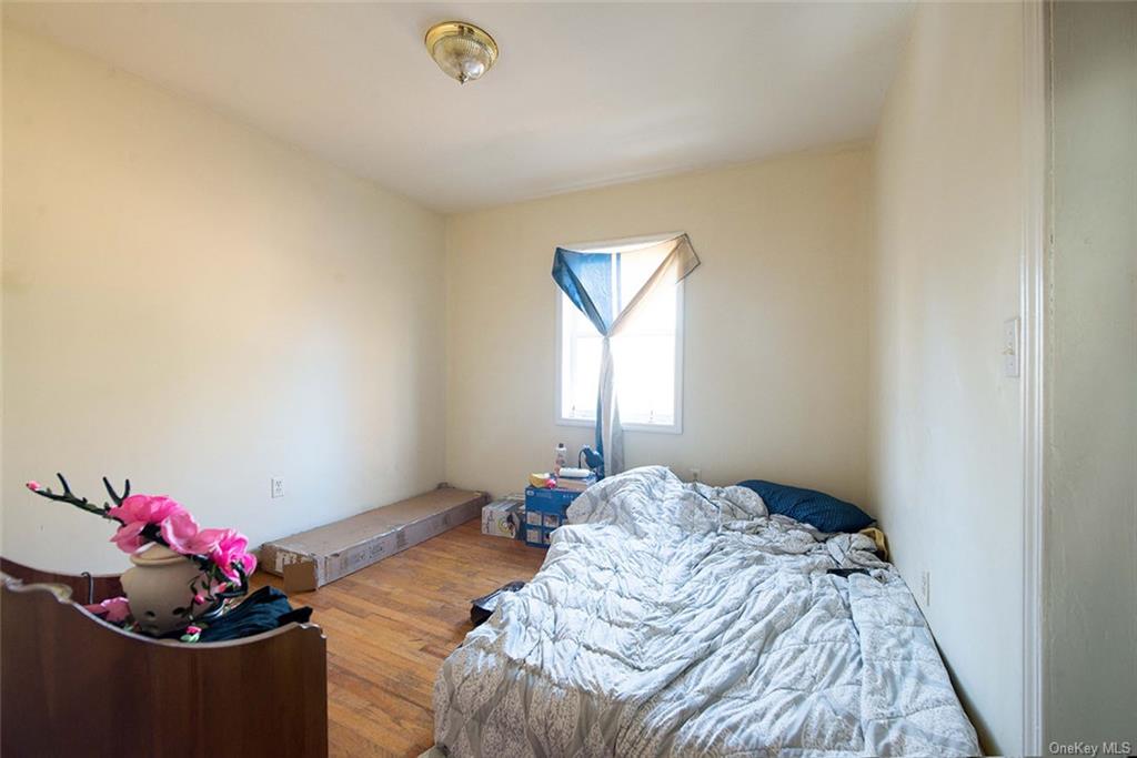 304 Wade Road Liberty, NY 12754 - Photo 12 of 35 a bedroom with a bed and a dresser