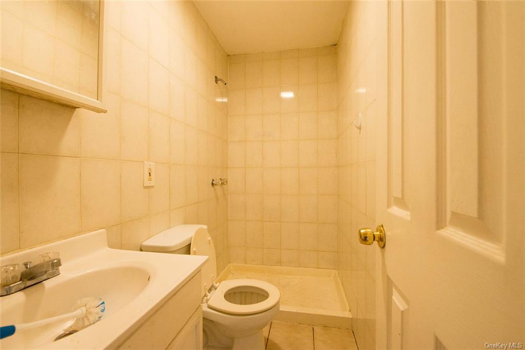 304 Wade Road Liberty, NY 12754 - Photo 23 of 35 a bathroom with a sink and a tub