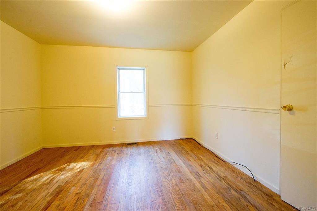 304 Wade Road Liberty, NY 12754 - Photo 26 of 35 a view of a room with wooden floor and a window