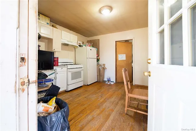 a bed room with a bed and a tv