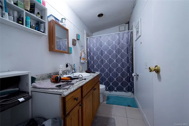 a kitchen with a sink a stove and appliances