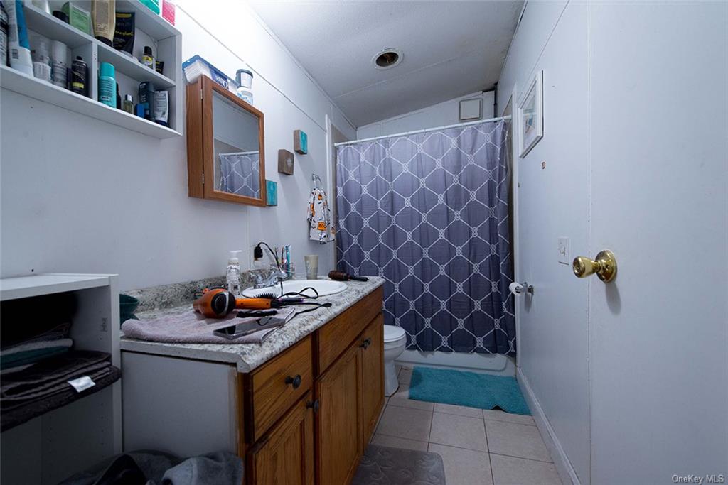 304 Wade Road Liberty, NY 12754 - Photo 33 of 35 a kitchen with a sink a stove and appliances