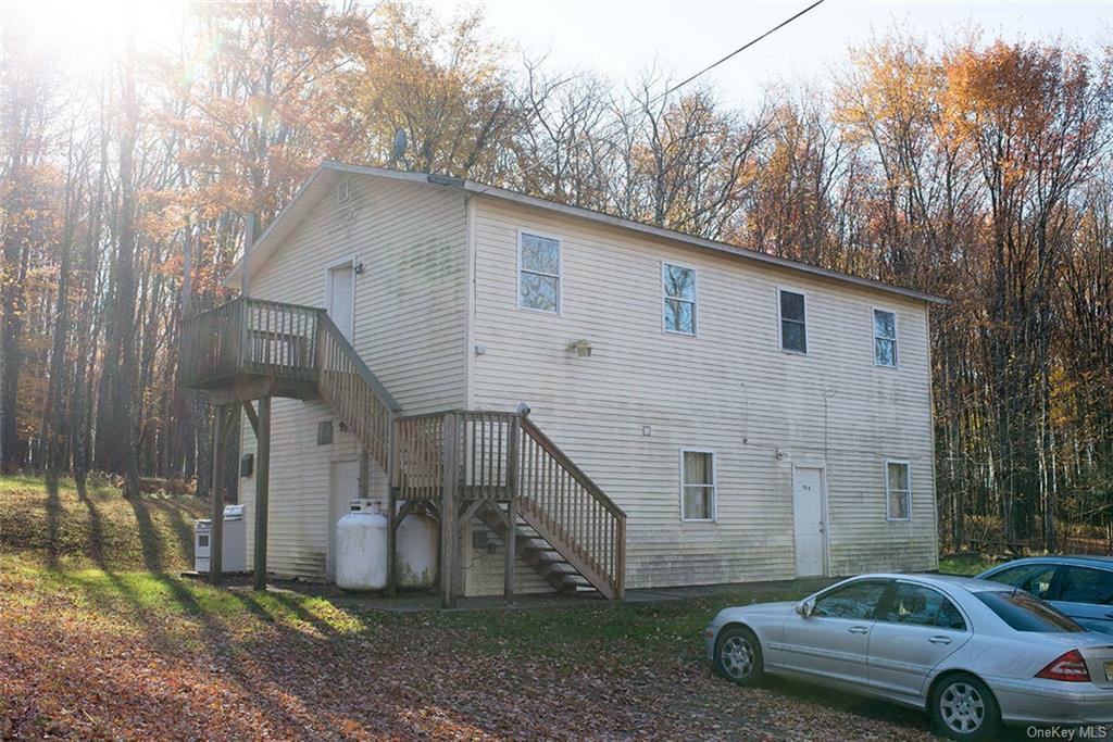 304 Wade Road Liberty, NY 12754 - Photo 4 of 35 a house view with a backyard space
